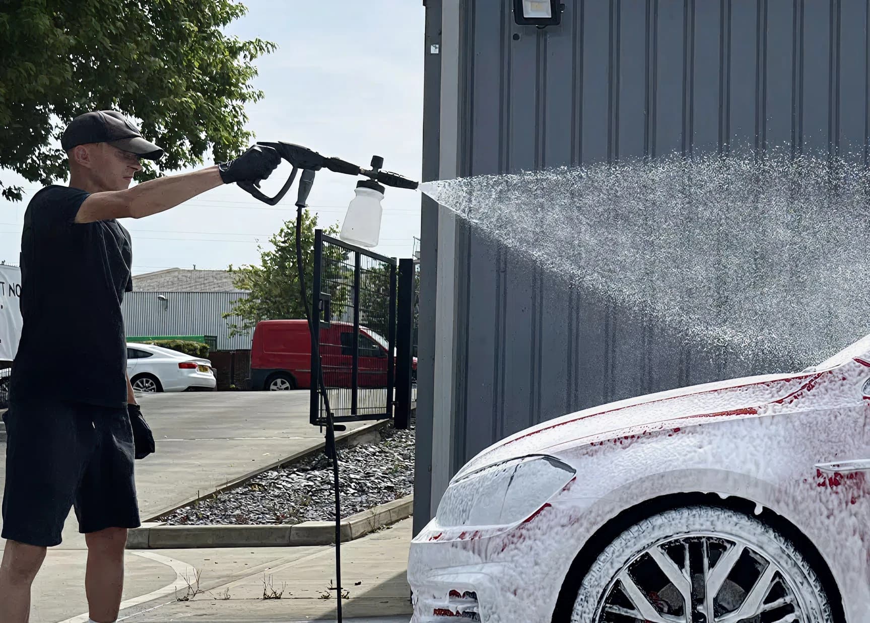A JWB mobile valeter washing a vehicle